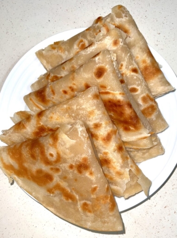 Folded chapati on a plate