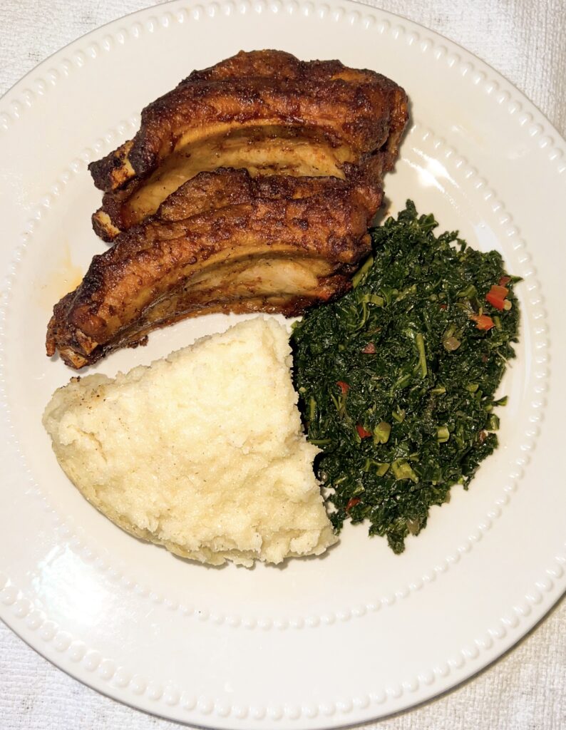 Pork ribs, ugali and kale