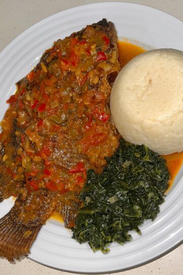 Tilapia, ugali and spinach