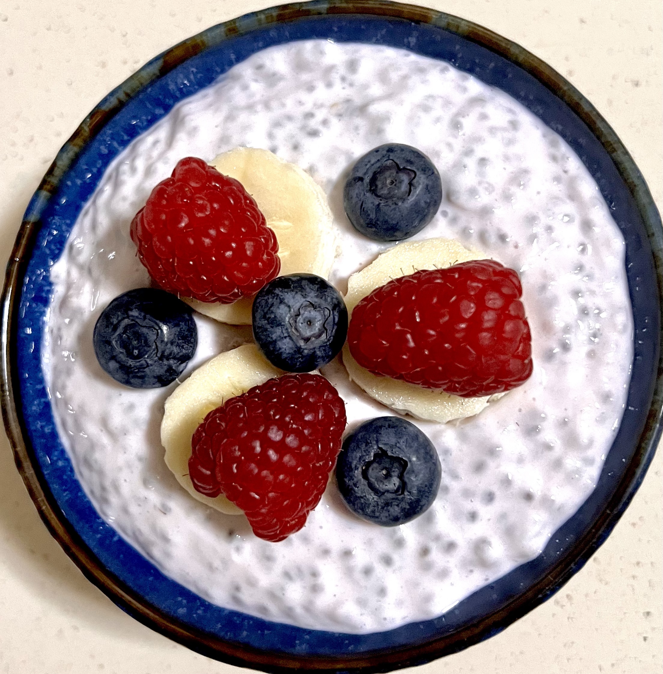 Chia seed pudding with fruit and berries upclose