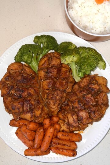 Chicken breast with veggies on a platter