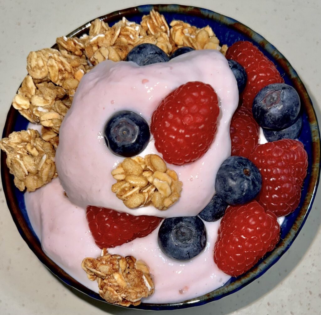 Yogurt granola and berries in a bowl