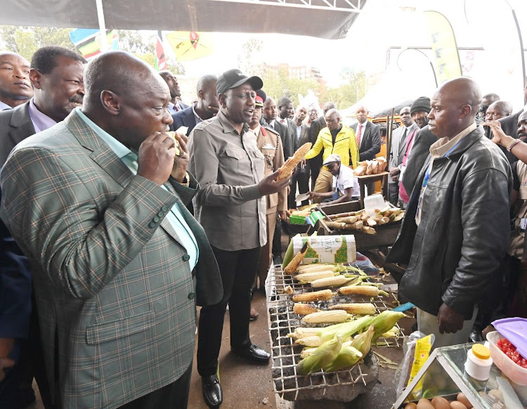 Kenyan VP Eating Roast Maize