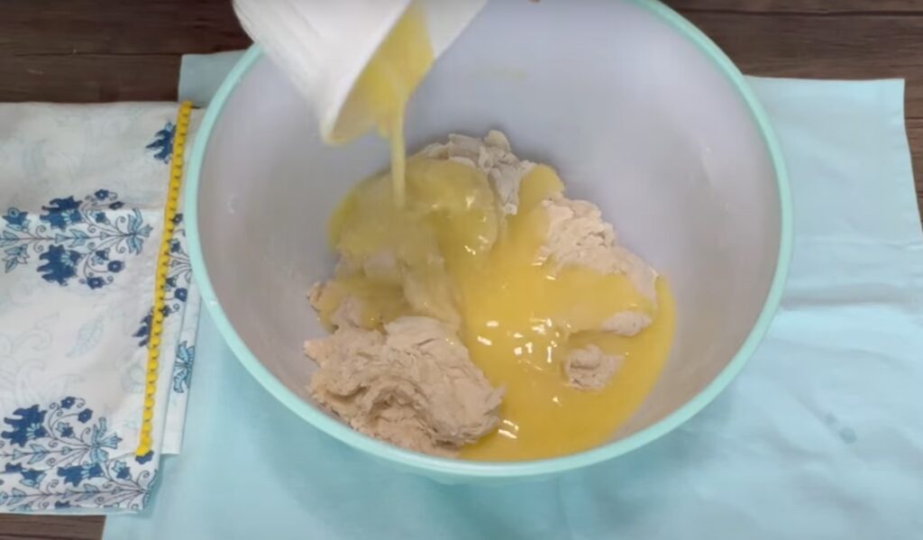 Adding butter to the dough