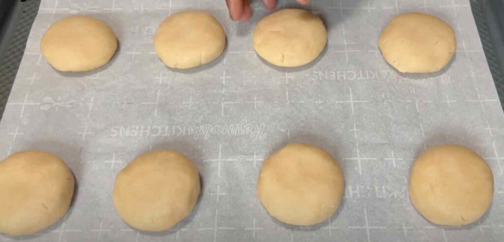 Raw cookies on a baking sheet